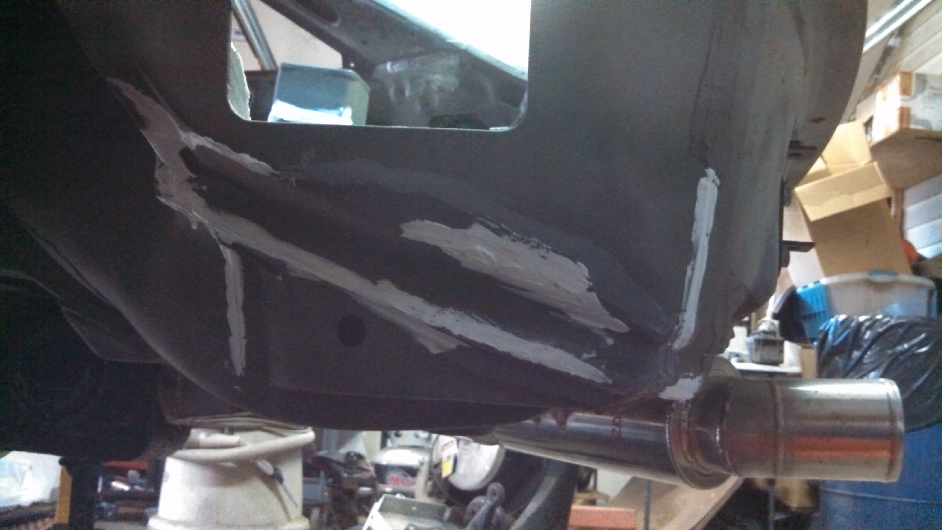 rear corner rust repair welded and sealed2.jpg