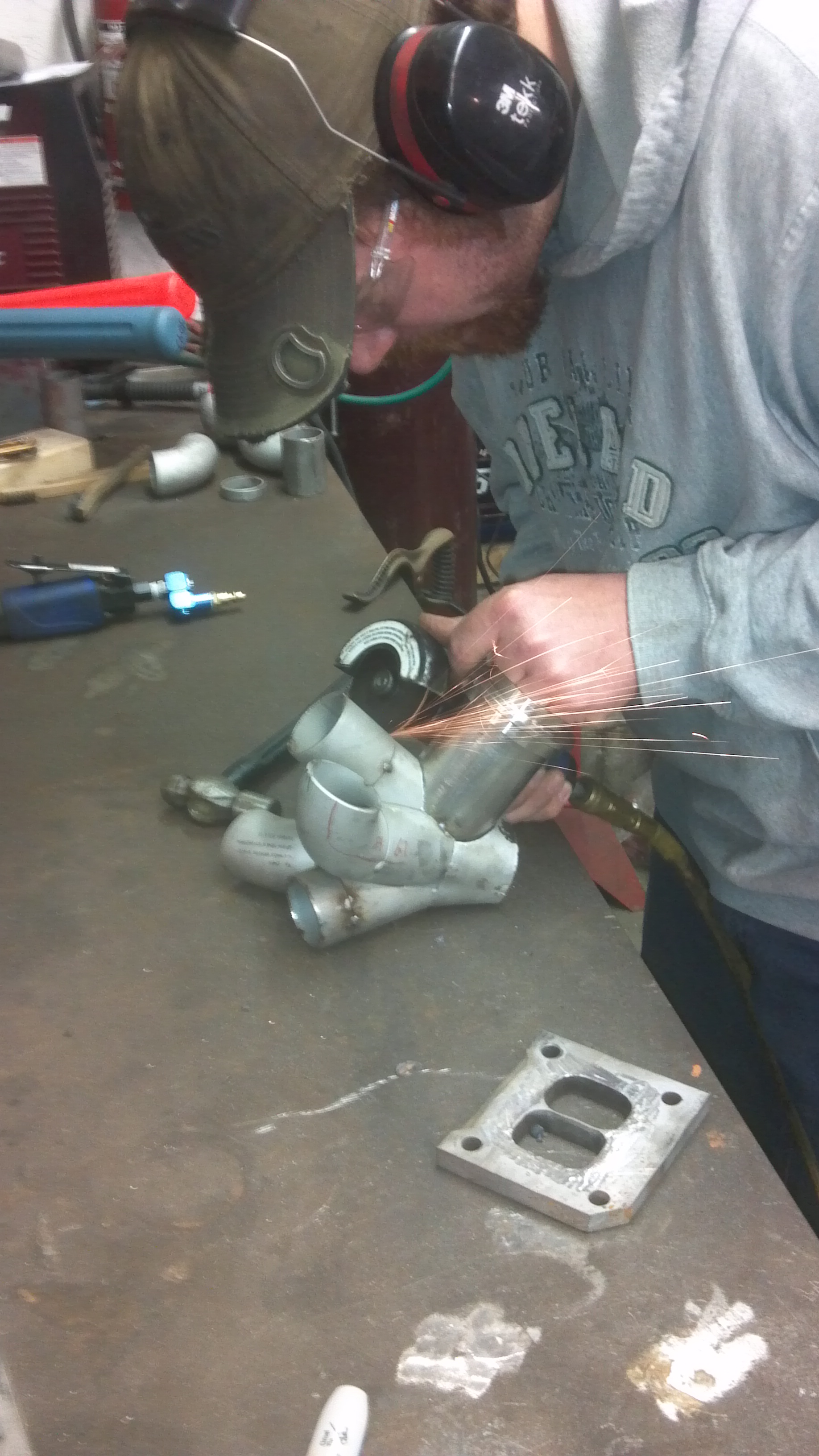 grinding down the SS mig tacks