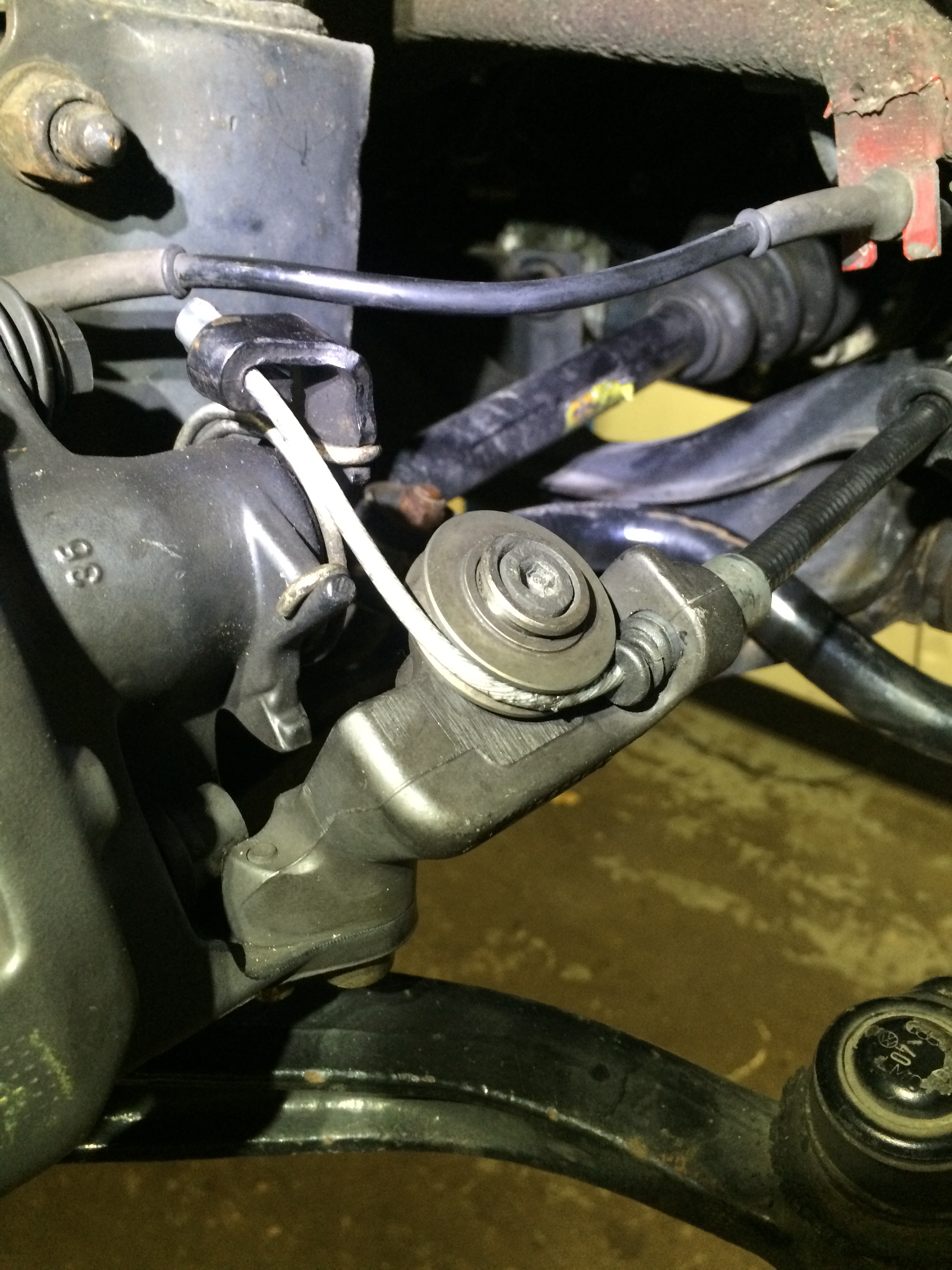 Boot trimmed to prevent interference with pulley. I left both ends of the rubber boot &amp; trimmed away the inner section of the boot. A bit of grease to help seal the end &amp; all is good. The pulley tends to keep the boot in place.