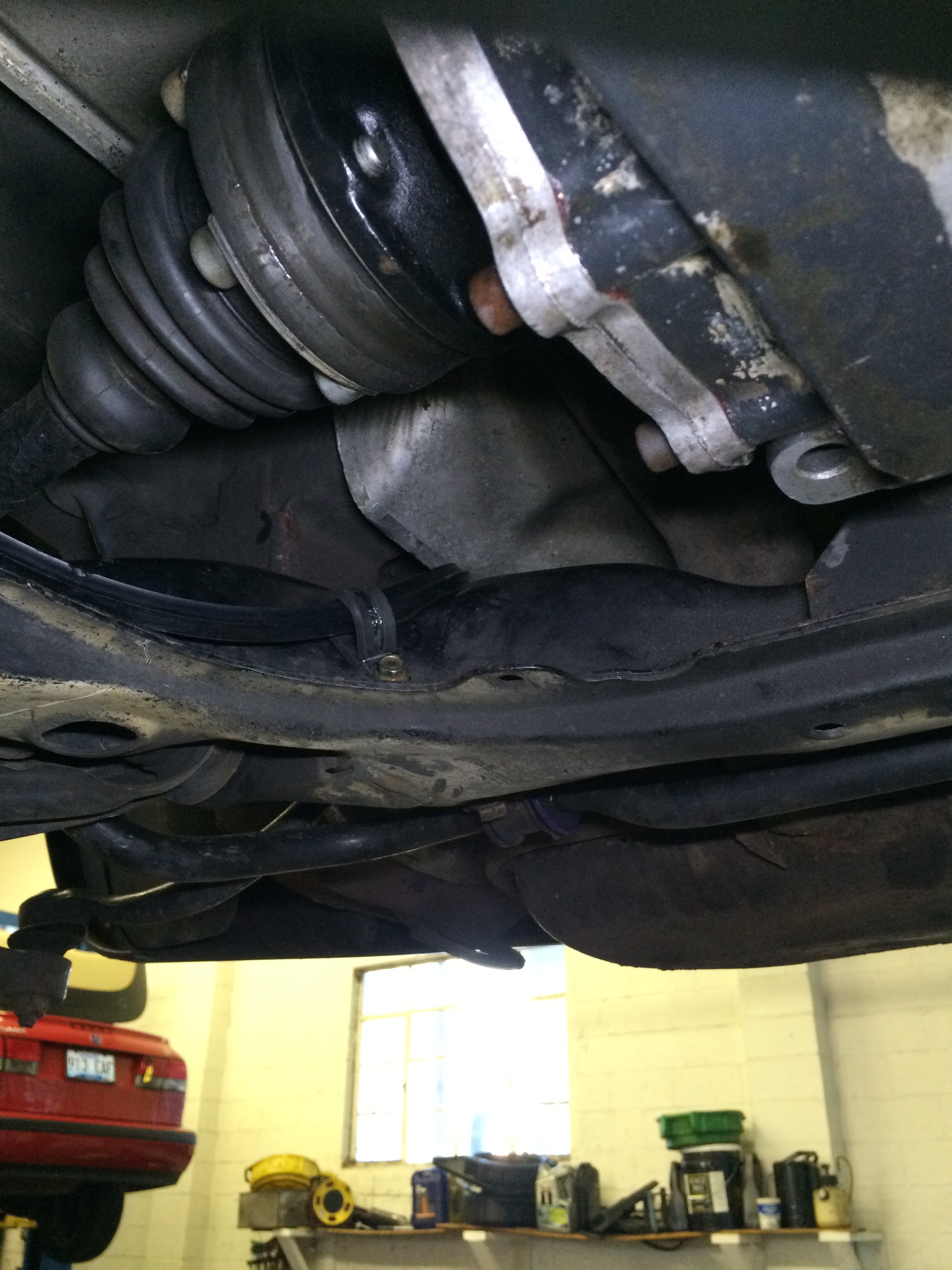 Adel clamp holding cable on right side.