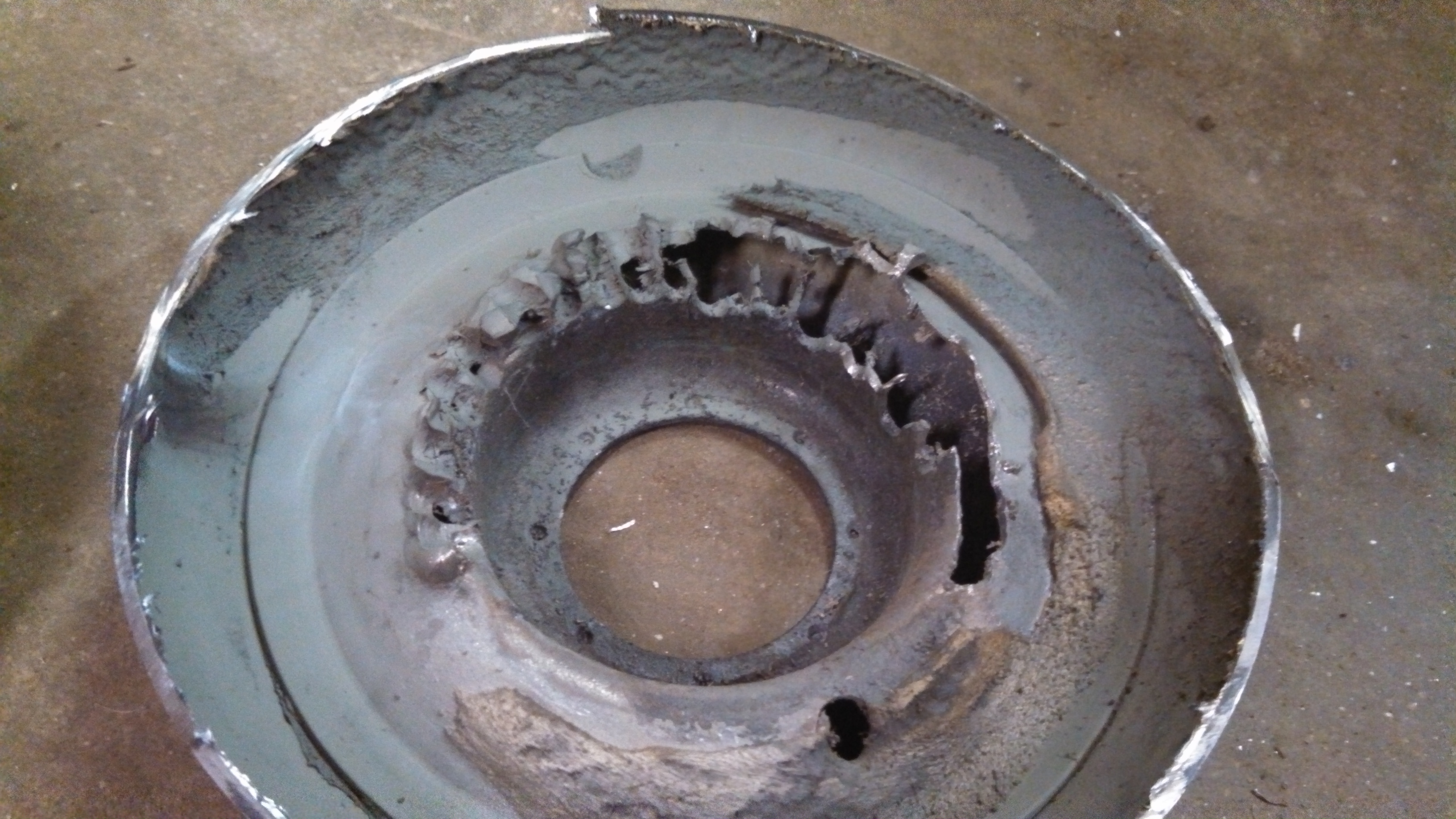 mangled rear driver side strut mount.jpg