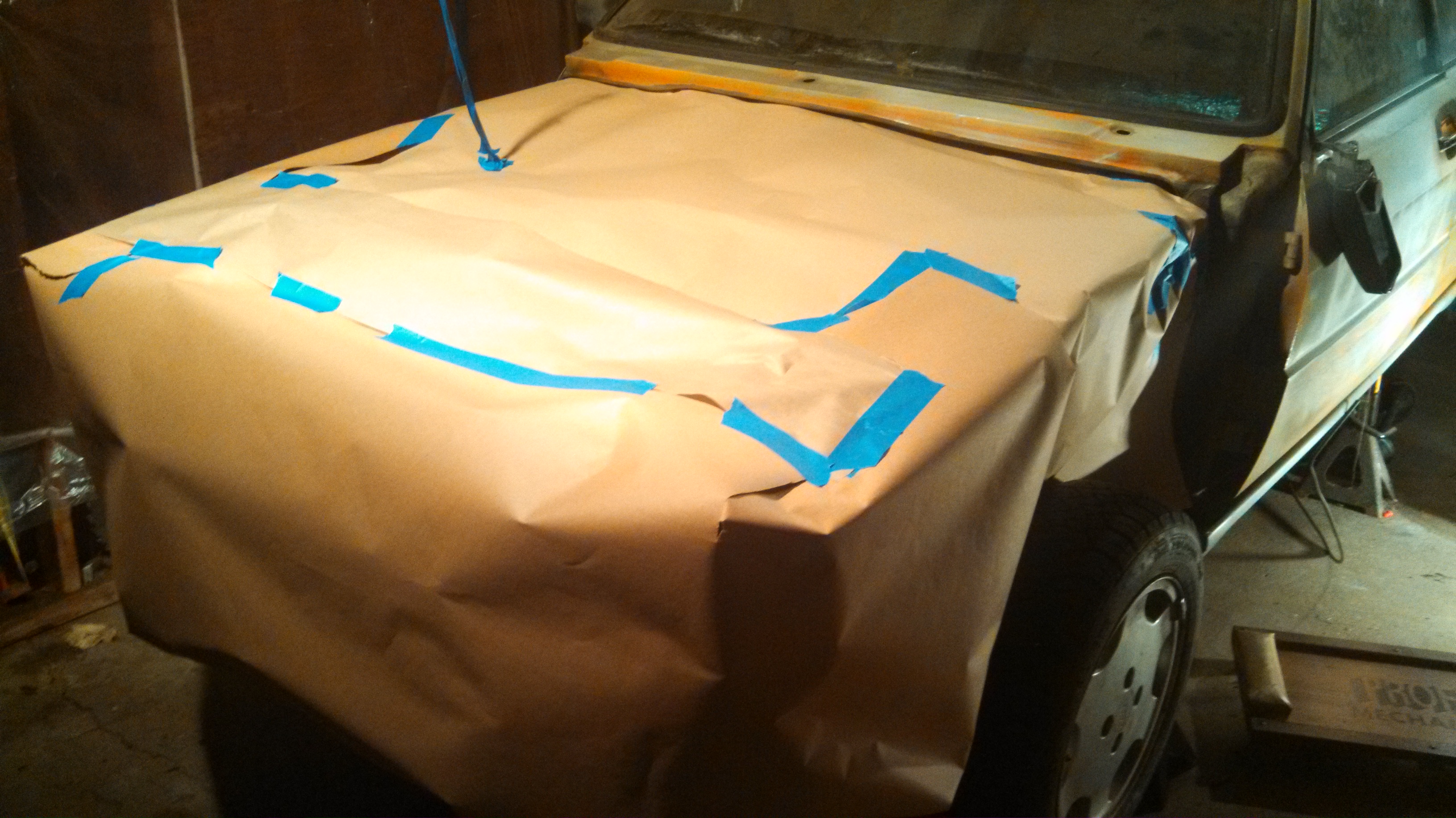 engine bay all sealed up for paint protection.jpg