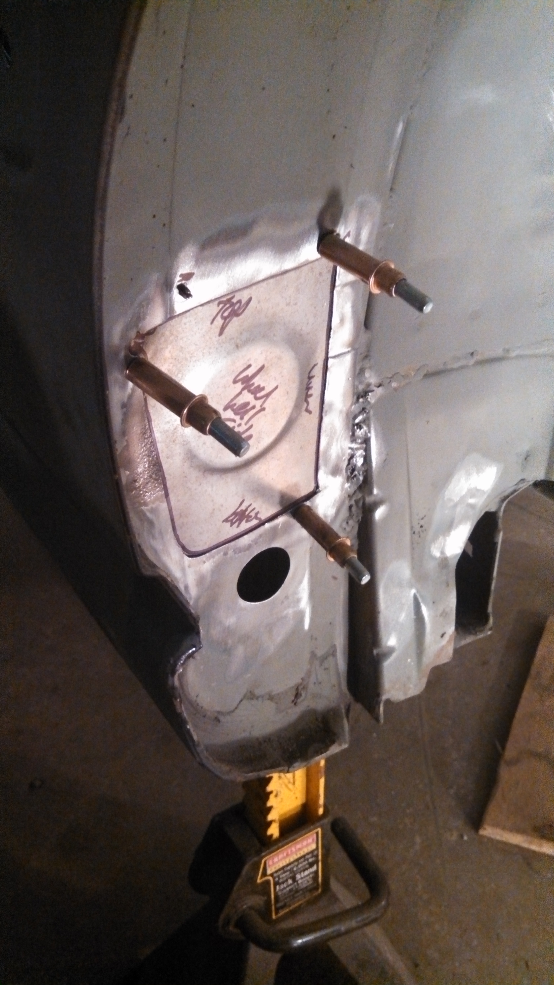 driver rear wheel well patch cleco'd in.jpg